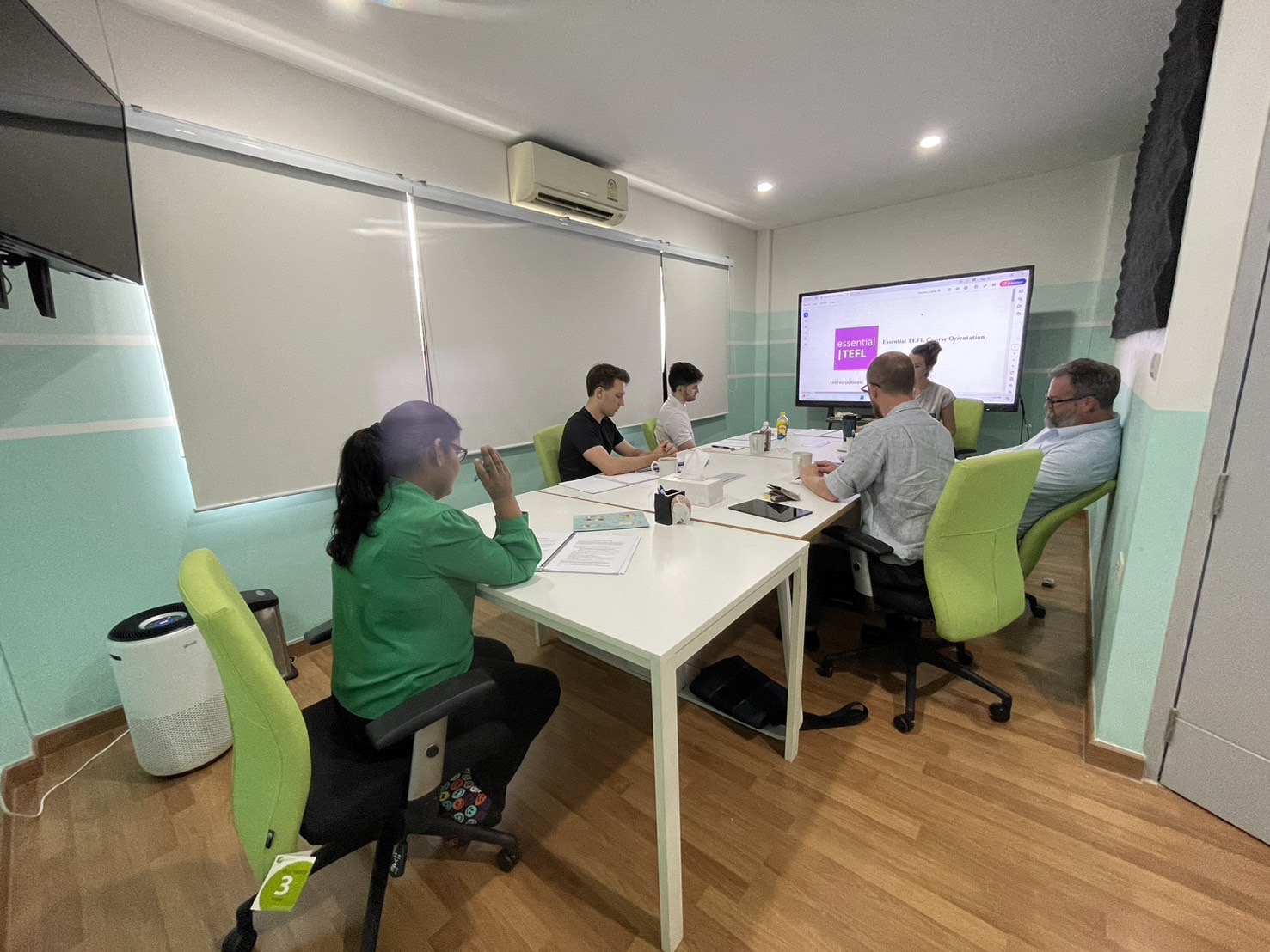 Trainee teacher delivering a lesson in Bangkok during Essential TEFL teaching practice